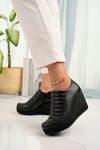 Dolgu Taban Fermuarlı Siyah Cilt Kadın Ayakkabı
